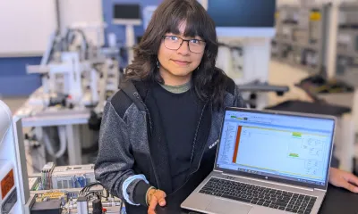 Ellen Carrillo Mayoral stands in Mechatronics Lab.
