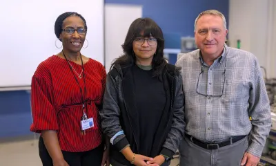 Ellen stands with her engineering instructors at RichmondCC.