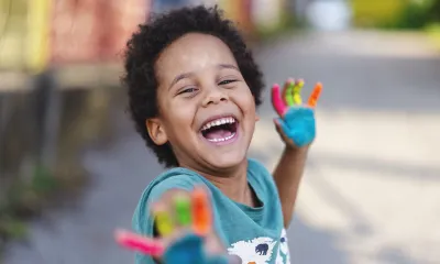 Child with painted hands