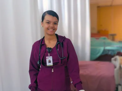 Hanna Chavis stands in a nursing lab.