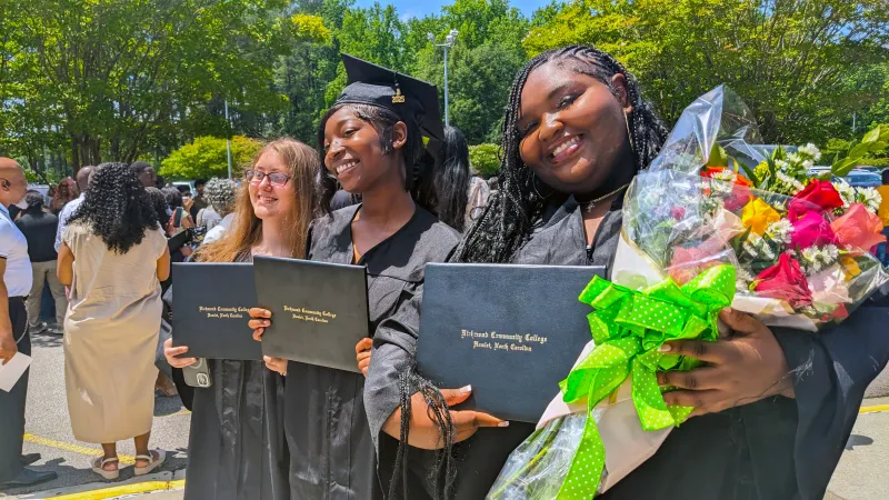 Graduates smiling